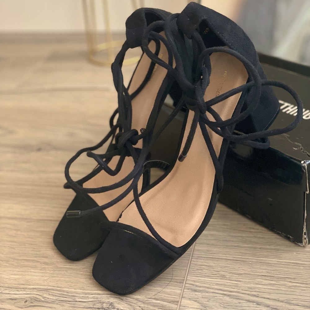 Black velvet pretty little thing block heels with strap up laces.